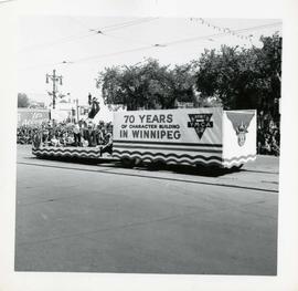 Winnipeg's 75th Anniversary parade - Y.M.C.A. float