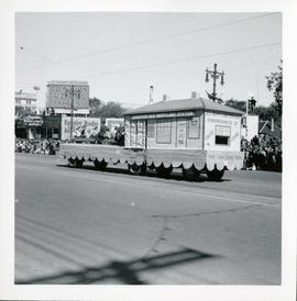 Winnipeg's 75th Anniversary parade - E.J. Casey Shows float
