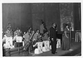 Louis Armstrong with his band and singer