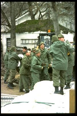 1997 flood - Scotia Street - military personnel removing dike