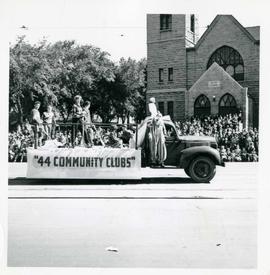 Winnipeg's 75th Anniversary parade - R. Litz and Sons movers "44 Community Clubs" float