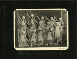 Dancers portraying the Northern Lights performing “Beauty and the Beast”