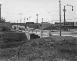Bridge over Omands Creek on Portage Avenue, looking west to Polo Park