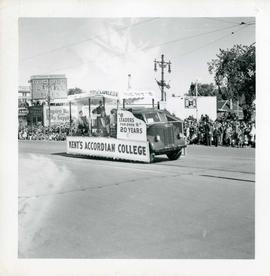 Winnipeg's 75th Anniversary parade - Kent's Accordian College float
