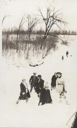 Group standing in deep snow