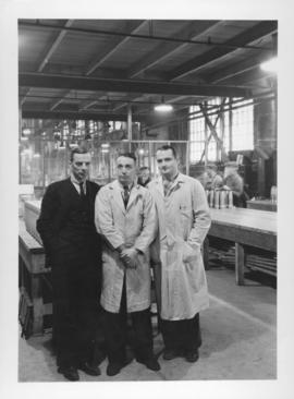 Time Keeper McWee, Machine Shop Foreman Bert Lug, and Plant Manager William Daum at Dominion Brid...