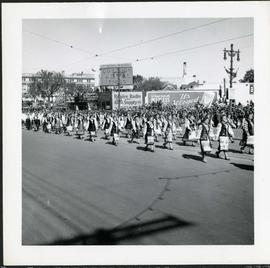 Winnipeg's 75th Anniversary parade - Ukrainian community [?] marching
