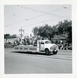 Winnipeg's 75th Anniversary parade - Manitoba Ladies Curling Association float