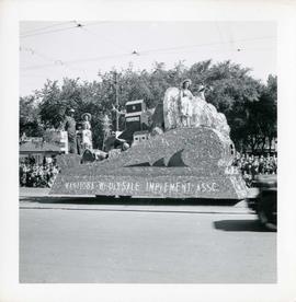 Winnipeg's 75th Anniversary parade - Manitoba Wholesale Implement Association float