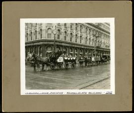 Banfiend’s Furniture carts in front of Empire Hotel