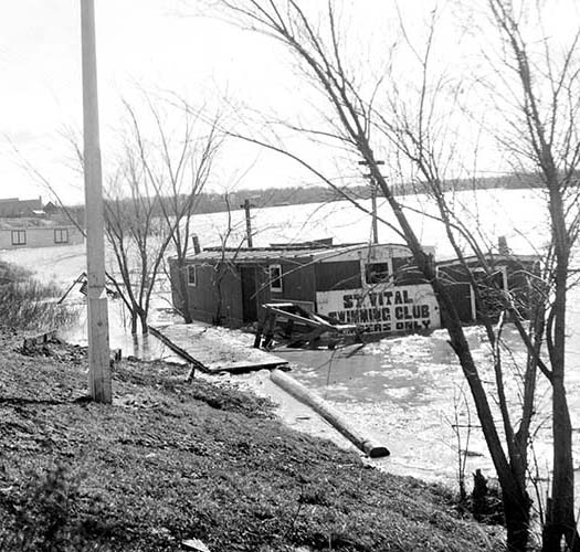 St. Vital Swimming Club submerged by flood waters in 1942. Parks and Recreation Photograph Collection (A70 File 1 Item 1).