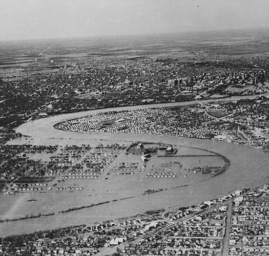 Aerial shot of Riverview submerged in flood waters during the 1950 flood. Photograph collection (P4 File 45).