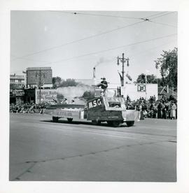 Winnipeg's 75th Anniversary parade - Manitoba Sporting Goods float