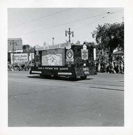 Winnipeg's 75th Anniversary parade - float of Canadian Fire Insrance and Canadian Indemnity Compa...