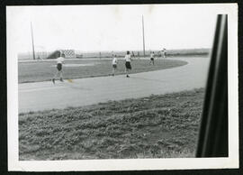 Children running on the St. James Memorial Park track