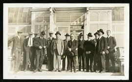A group photo taken in front of the original Assiniboine Park Conservatory